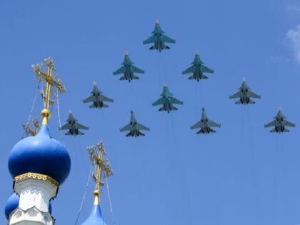 TOPSHOT - Russian Sukhoi Su-35S fighter aircrafts, Su-34 military fighter jets and Su-30SM