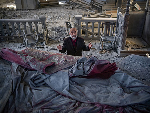 Arthur Sahakyan, 63, prays inside the damaged Ghazanchetsots (Holy Saviour) Cathedral in the historic city of Shusha, some 15 kilometers from the disputed Nagorno-Karabakh province's capital Stepanakert, that was hit by a bomb during the fighting between Armenia and Azerbaijan over the breakaway region, on October 13, 2020. - Nagorno-Karabakh …