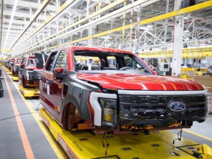 Ford F-150 Lightning pickup trucks sit on the production line at the Ford Rouge Electric V