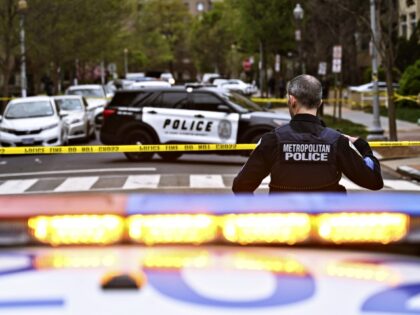 WASHINGTON DC, US - APRIL 07: Police officers cordon off the scene after a body found shot near George Washington University Hospital in Washington DC, United States on April 07, 2023. (Photo by Celal Gunes/Anadolu Agency via Getty Images)