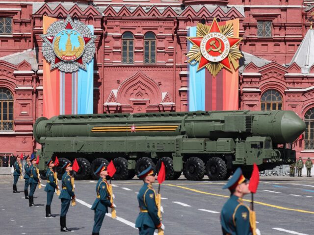 A Russian Yars intercontinental ballistic missile launcher rolls through Red Square during