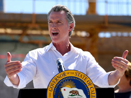 California Gov. Gavin Newsom speaks to reporters during a visit the Antioch Water Treatmen