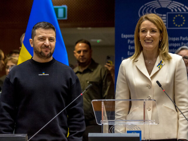 BRUSSELS, BELGIUM - FEBRUARY 09: Ukrainian President Volodymyr Zelensky (left) stands with