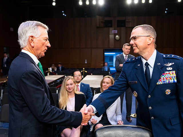 Sen. Tommy Tuberville, R-Ala., shakes hands with Air Force Lt. Gen. Gregory M. Guillot bef