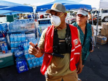 Archie Kalepa and Melissah Shishido team up to gather supplies for Lahaina residents victimized by the recent fire. (Robert Gauthier/Los Angeles Times via Getty Images)