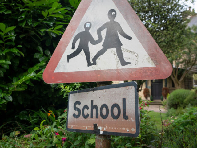 A detail of a warning sign for a nearby village school at Edale in the Peak District Natio