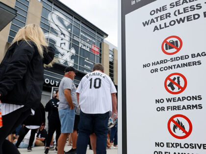 Signs informing fans of prohibited items are displayed at an entrance to Guaranteed Rate Field before a game between the White Sox and Athletics on Saturday. (John J. Kim/Chicago Tribune/Tribune News Service via Getty Images)