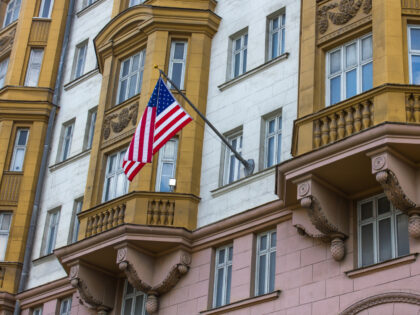 The American flag flies on the wall of the embassy building in the historic building in Moscow