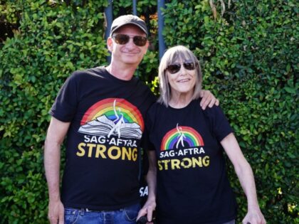 David Zimmerman and Geri Jewell walk the picket line in support of the SAG-AFTRA and WGA s