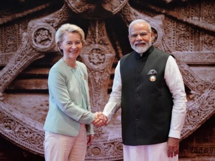 India's Prime Minister Narendra Modi (R) shakes hand with European Commission President Ursula von Der Leyen ahead of the G20 Leaders' Summit at the Bharat Mandapam in New Delhi on September 9, 2023. (Photo by Evan Vucci / POOL / AFP) (Photo by EVAN VUCCI/POOL/AFP via Getty Images)