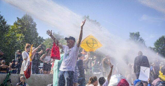 Dutch Police Clear Thousands of Climate Crazies from Highway with Water Cannons