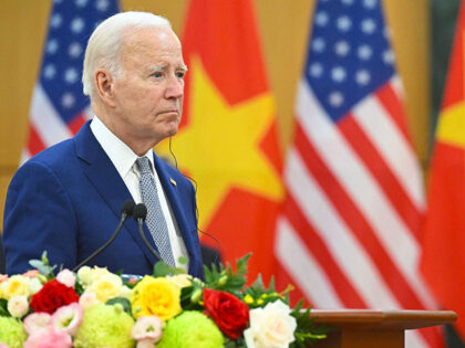 President Joe Biden looks on as Vietnam's Communist Party General Secretary Nguyen Phu Trong speaks to the media at the Communist Party of Vietnam Headquarters in Hanoi on September 10, 2023. Biden travels to Vietnam to deepen cooperation between the two nations, in the face of China's growing ambitions in …