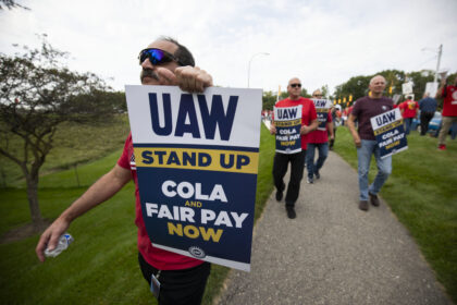 AUBURN HILLS, MICHIGAN - SEPTEMBER 20: United Auto Workers members and supporters rally at