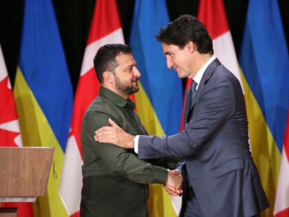 Canadian Prime Minister Justin Trudeau (R) and Ukraine's President Volodymyr Zelensky shake hands at the end of a news conference on Parliament Hill on September 22, 2023 in Ottawa. (Photo by Dave Chan / AFP) (Photo by DAVE CHAN/AFP via Getty Images)