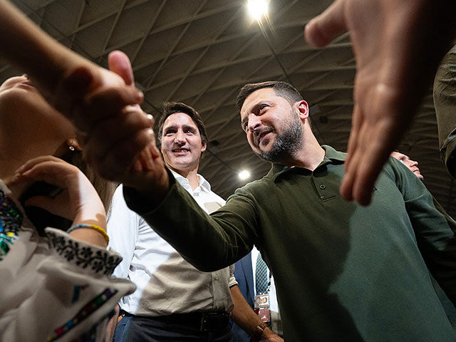 Canada's Prime Minister Justin Trudeau (L) and Ukraine's President Volodymyr Zelensky greet attendees during an event with the Ukrainian-Canadian community in Toronto, Canada, on September 22, 2023. (Photo by Geoff Robins / AFP) (Photo by GEOFF ROBINS/AFP via Getty Images)