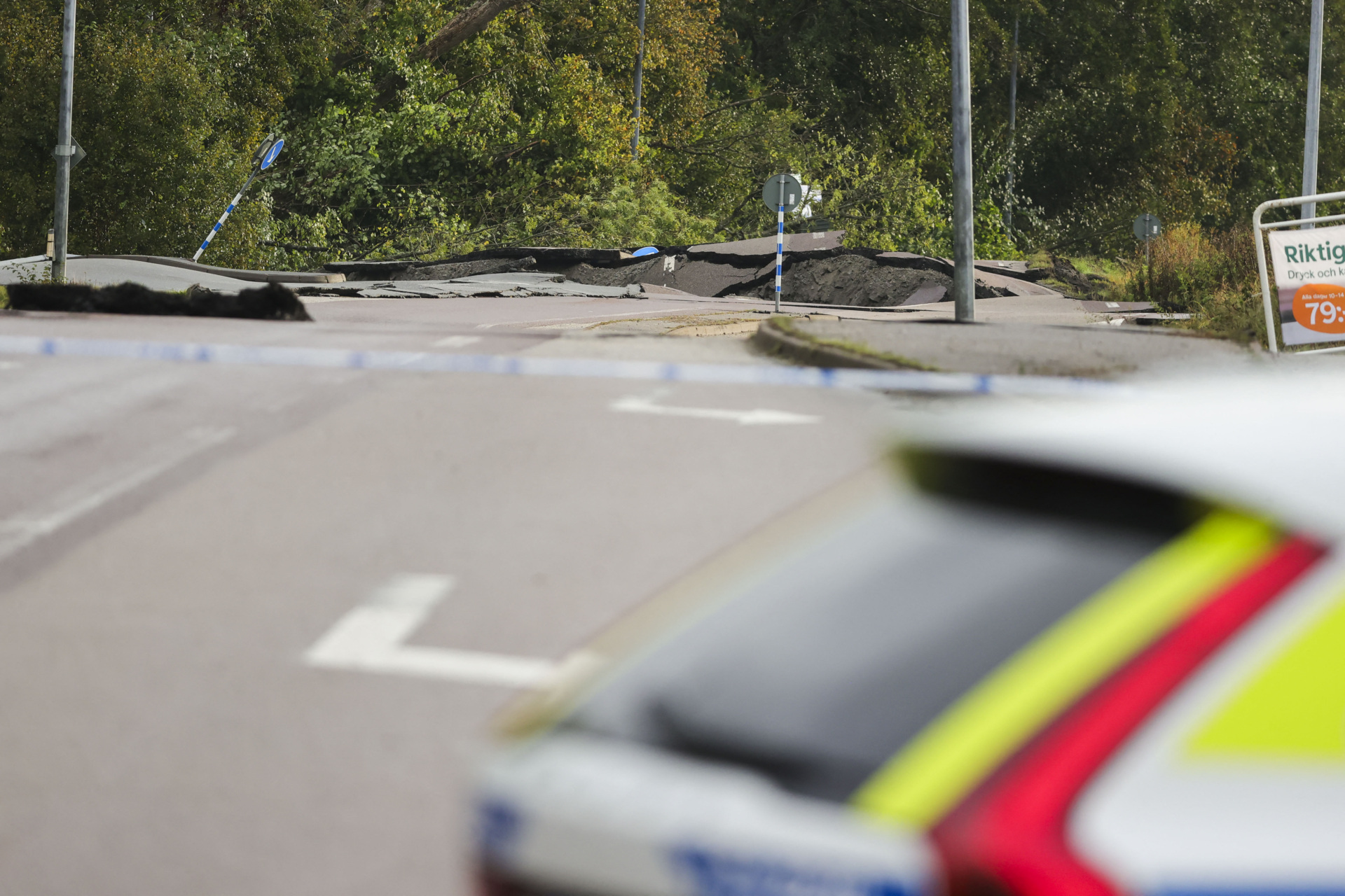 A destroyed street is seen near Stenungsund, Sweden, on September 23, 2023. The E6 highway near Stenungsund was closed in both directions after persistent rain had caused a large landslide where several cars and a buses went down. Three people were said to be injured. (Photo by Adam IHSE / TT News Agency / AFP) / Sweden OUT (Photo by ADAM IHSE/TT News Agency/AFP via Getty Images)