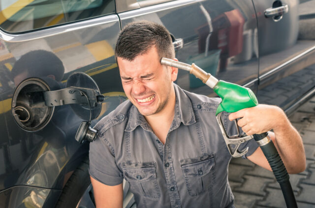 Young adult shooting himself over crazy petrol and fuel prices.