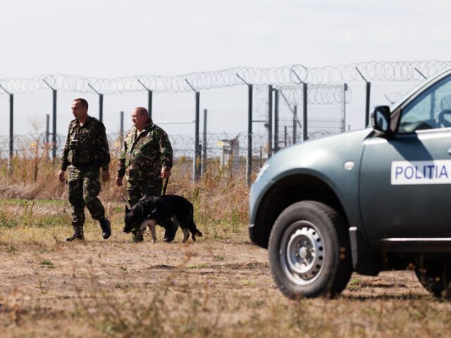 Policemen patrol the border area at Triplex Confinium, where the borders of Romania, Hunga