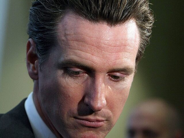 SAN FRANCISCO - OCTOBER 27: San Francisco mayor Gavin Newsom pauses while speaking at the grand opening of the new Charles Schwab office October 27, 2009 in San Francisco, California. After one year on the campaign trail, San Francisco mayor Gavin Newsom dropped out of the race for California governor …