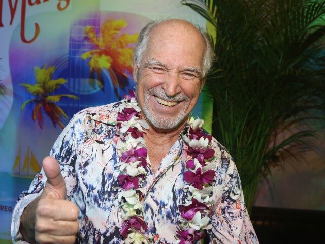 Jimmy Buffett arrives at the Opening Night of The Jimmy Buffett Musical "Escape To Margari