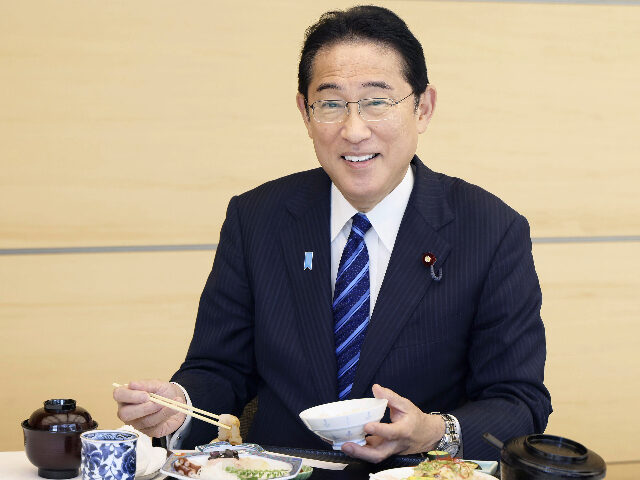 In this photo provided by Cabinet Public Affairs Office, Japanese Prime Minister Fumio Kis