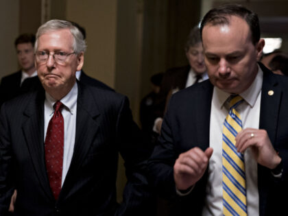 Senate Majority Leader Mitch McConnell, a Republican from Kentucky, left, and Senator Mike Lee, a Republican from Utah, walk through the U.S. Capitol in Washington, D.C., U.S., on Monday, Sept. 24, 2018. McConnell said on the Senate floor today that Supreme Court nominee Brett Kavanaugh will get an up-or-down vote …