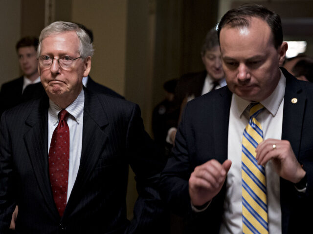 Senate Majority Leader Mitch McConnell, a Republican from Kentucky, left, and Senator Mike Lee, a Republican from Utah, walk through the U.S. Capitol in Washington, D.C., U.S., on Monday, Sept. 24, 2018. McConnell said on the Senate floor today that Supreme Court nominee Brett Kavanaugh will get an up-or-down vote …
