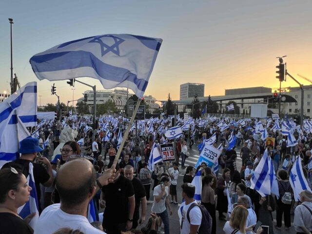 Supporters of Israel's proposed judicial reforms rally outside the Supreme Court in J