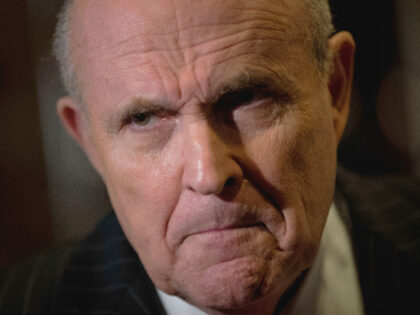 NEW YORK, NY - JANUARY 12: Former New York City Mayor Rudy Giuliani speaks to reporters at