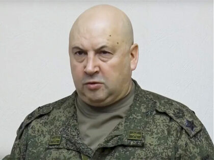 FILE - In this handout photo taken from video released by Russian Defense Ministry Press Service on Wednesday, Nov. 9, 2022, the top Russian military commander in Ukraine, Gen. Sergei Surovikin reports to Russian Defense Minister Sergei Shoigu during their meeting. Russia’s president has succeeded in exiling Wagner mercenary head …