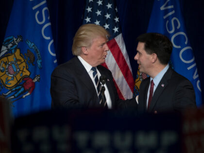 Gov. Scott Walker, R-Wis., right, greets Republican presidential candidate Donald Trump after introducing him during a campaign rally at the University of Wisconsin Eau Claire, Tuesday, Nov. 1, 2016, in Eau Claire, Wis. (AP Photo/Matt Rourke)