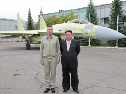 Communist dictator Kim Jong-un of North Korea poses with a Russian fighter pilot on a visit to far-east Russia, week of September 11, 2023.