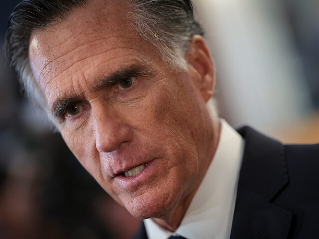 WASHINGTON, DC - SEPTEMBER 13: Sen. Mitt Romney (R-UT) answers questions in his office aft