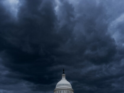 WASHINGTON - MAY 3: Dark clouds hang over the U.S. Capitol dome in Washington on Wednesday