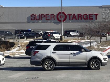 Omaha, Neb., police officers gather outside a Target store in Omaha on Tuesday, Jan. 31, 2