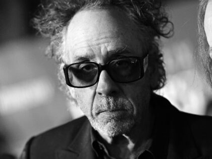 LOS ANGELES, CALIFORNIA - NOVEMBER 16: (EDITOR'S NOTE: Image was created in black and white. Color version not available.)Tim Burton attends the world premiere of Netflix's "Wednesday" on November 16, 2022 in Los Angeles, California. (Photo by Charley Gallay/Getty Images for Netflix)