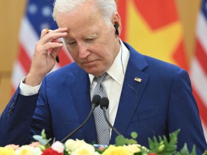 US President Joe Biden gestures as Vietnam's Communist Party General Secretary Nguyen Phu Trong speaks to the media at the Communist Party of Vietnam Headquarters in Hanoi on September 10, 2023. Biden travels to Vietnam to deepen cooperation between the two nations, in the face of China's growing ambitions in …