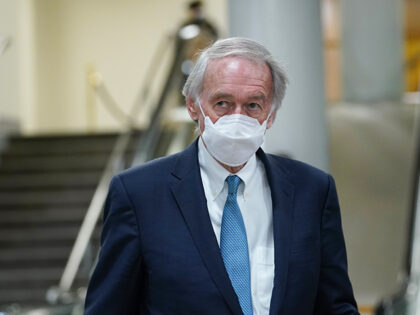 In this Feb. 12, 2021, file photo Sen. Ed Markey, D-Mass., walks on Capitol Hill in Washington after the fourth day of the second impeachment trial of former President Donald Trump. President Joe Biden’s hope of pouring billions of dollars into green infrastructure investments is running into the political obstacle …