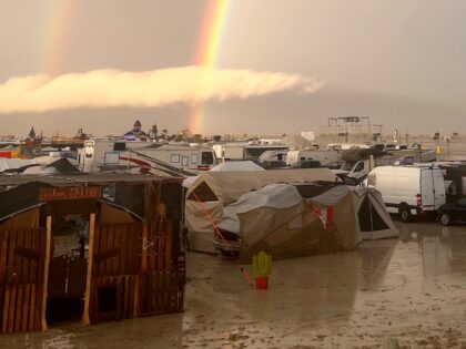 04 September 2023, USA, Black Rock: Undated image shows rainbow seen over the muddy grounds of the "Burning Man" festival. Tens of thousands of visitors to the desert festival "Burning Man" are stranded on the site in the US state of Nevada after heavy rainfall over the weekend. Photo: David …