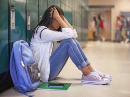 distressed middle school girl (Getty)