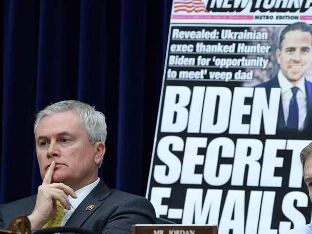 WASHINGTON, DC - FEBRUARY 08: With a poster of a New York Post front page story about Hunter Biden’s emails on display, Committee Chairman Rep. James Comer (R-KY) and Rep. Jim Jordon (R-OH) listen during a hearing before the House Oversight and Accountability Committee at Rayburn House Office Building on …