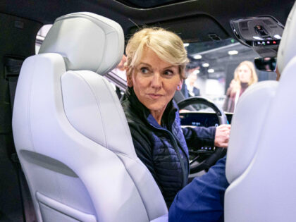 Energy Secretary Jennifer Granholm sits in a Cadillac Lyriq all electric vehicle during a visit to the Washington Auto Show in Washington, Wednesday, Jan. 25, 2023. (AP Photo/Andrew Harnik)