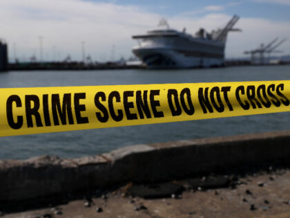 OAKLAND, CALIFORNIA - MARCH 10: Crime scene tape marks off the area where members of the media are staging near the Princess Cruises Grand Princess cruise ship as it sits docked in the Port of Oakland on March 10, 2020 in Oakland, California. Passengers are slowly disembarking from the Princess …