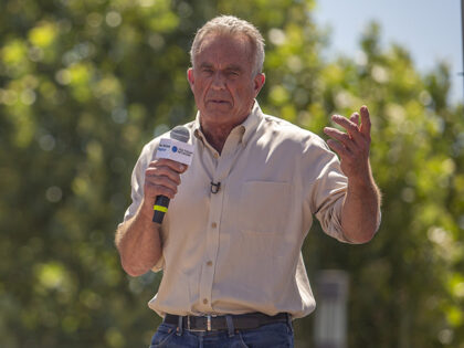 Robert F. Kennedy Jr., partner with Morgan & Morgan PA and 2024 Democratic presidential candidate, speaks at the Des Moines Register political soapbox during the Iowa State Fair in Des Moines, Iowa, US, on Saturday, Aug. 12, 2023. Republican presidential hopefuls are crowding into Des Moines this weekend, hoping to …