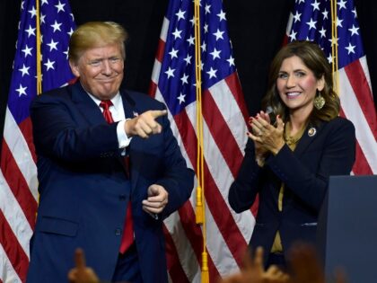 President Donald Trump speaks during a fundraiser for Republican gubernatorial hopeful Kristi Noem, left, in Sioux Falls, S.D., Friday, Sept. 7, 2018. Trump is speaking at the Noem-Rhoden Victory Committee, a joint fundraising committee authorized by and composed of Kristi Noem for Governor, Larry Rhoden for Lieutenant Governor, KRISTI PAC …