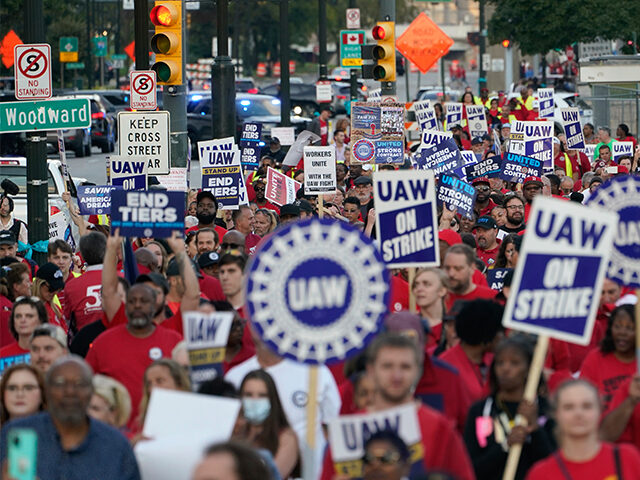 United Auto Workers members march through downtown Detroit, Friday, Sept. 15, 2023. The UAW is conducting a strike against Ford, Stellantis and General Motors. (AP Photo/Paul Sancya)