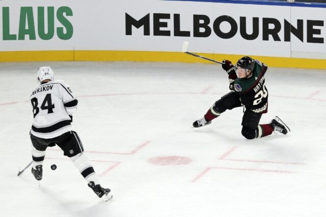 Arizona Coyotes' Barrett Hayton shoots during the NHL Global Series match between the Los