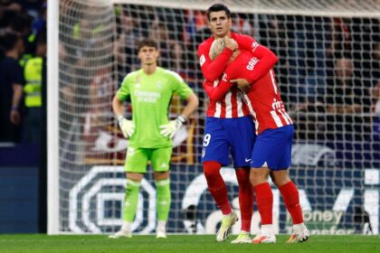 Atletico Madrid forwards Antoine Griezmann (R) and Alvaro Morata (L) both scored in the thrilling derby clash with Real Madrid on Sunday