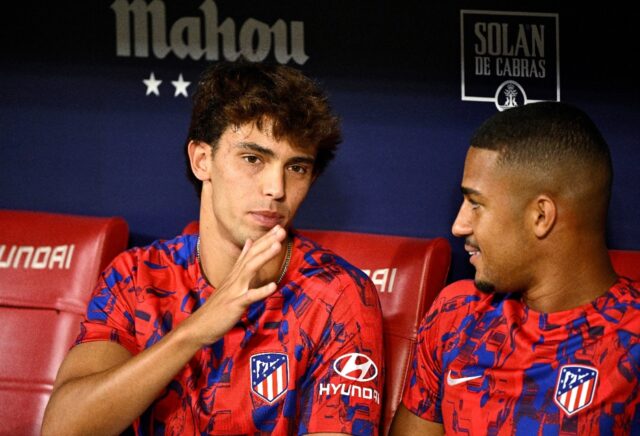 Atletico Madrid's Portuguese forward Joao Felix (L) has agreed to join Barcelona on loan f