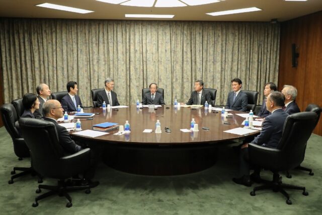 Bank of Japan governor Kazuo Ueda (C) and the policy board stood pat on monetary policy an
